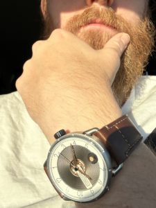 Man with beard wearing Timeless watch
